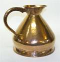 An Oversized Copper Ewer