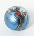 An Orient and Flume Glass Paperweight