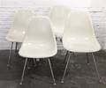 A Group of Four Charles and Ray Eames Chairs