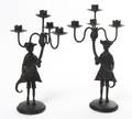 A Pair of Cast Metal Figural FourLight Candelabra