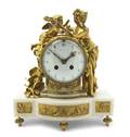 A French Gilt Bronze and Marble Figural Mantel Clock retailed by Tiffany  Co