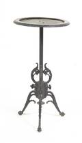 A Cast Iron Figural Stove Lamp