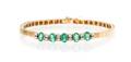 A 14 Karat Gold Emerald and Diamond Bracelet