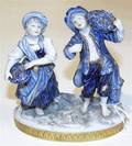 A Volkstedt Porcelain Figural Group