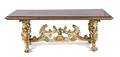 A Renaissance Style Painted and Parcel Gilt Carved Wood Trestle Table