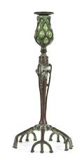 A Tiffany Studios Bronze and Favrile Glass Candlestick