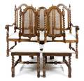 A Set of Twelve Jacobean Style Walnut Dining Chairs