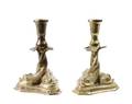 A Pair of Brass Figural Candlesticks