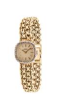 A 14 Karat Yellow Gold and Diamond Wristwatch Girard Perregaux