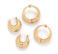 A Collection of 14 Karat Yellow Gold Hoop Earrings