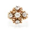 A 14 Karat Yellow Gold and Diamond Ring