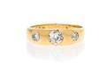 An 18 Karat Yellow Gold and Diamond Ring