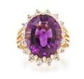 A 14 Karat Yellow Gold Amethyst and Diamond Ring