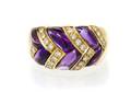 An 18 Karat Yellow Gold Amethyst and Diamond Ring