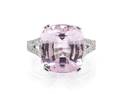 A 14 Karat White Gold Kunzite and Diamond Ring