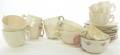 Twelve Belleek Cup and Saucer Sets