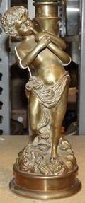 A Brass Figural Candlestick