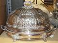 A SilverPlate Cloche and Well and Tree Warming Stand
