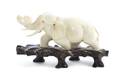 A Carved Ivory Figure of an Elephant