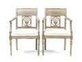 A Pair of Regency Style Painted and Parcel Gilt Open Armchairs