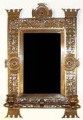 An Aesthetic Movement Brass Mirror