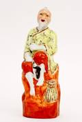 Chinese Porcelain Figure of a Fisherman