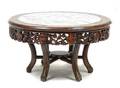 A Chinese Carved Hardwood Pedestal Table