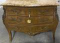 A Louis XV Style Chest of Drawers