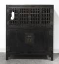 A Chinese Monochrome Wood Cabinet