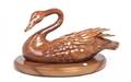 A Carved Wood Figure of a Swan