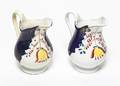 A Pair of Gaudy Milk Pitchers