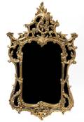 A Rococo Style Giltwood Mirror