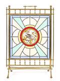 A Victorian Brass Stained and Caned Glass Fireplace Screen