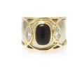 An 18 Karat Gold Onyx and Diamond Ring