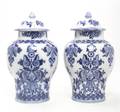 A Pair of Dutch Blue and White Lidded Urns