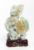 A Carved Jadeite Covered Urn