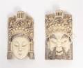A Pair of Carved Ivory Masks