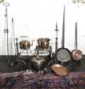 A Collection of Vintage Copper and Brass Cauldrons and Oversized Pans