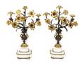 A Pair of Louis XVI Style Gilt Bronze FourLight Candelabra