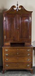 An American Fruitwood Banded Mahogany Cabinet