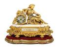 A Victorian Gilt Metal and Onyx Mantle Clock
