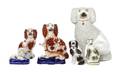 Four Staffordshire Polychrome Decorated Dogs