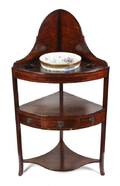 A George III Mahogany Corner Washstand