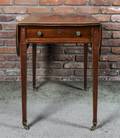 A George III Fruitwood Strung Mahogany Pembroke Table