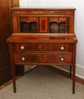 An English Sheraton Style Mahogany and Kingwood Porcelain Mounted Writing Cabinet