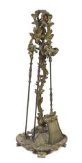 A Set of Louis XV Style Gilt Bronze Fireplace Tools on Stand