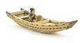 A Carved Bone Boat