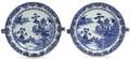 A Near Pair of Blue and White Decorated Warming Dishes