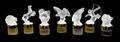 Seven Lalique Molded and Frosted Glass Perfume Bottles