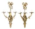 A Pair of Louis XVI Style Gilt Bronze ThreeLight Sconces